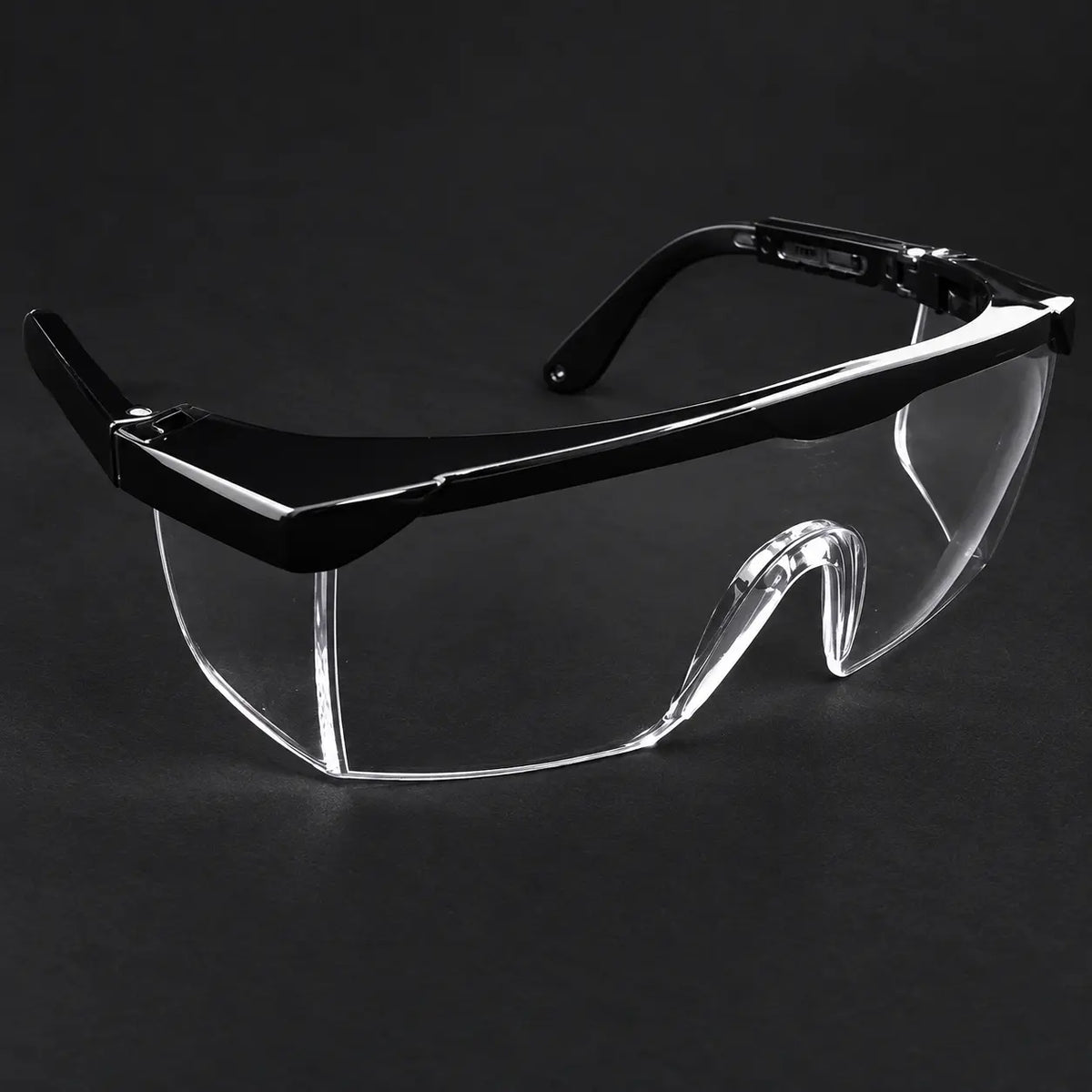 Clear medical protective safety glasses with black frame for eye protection.