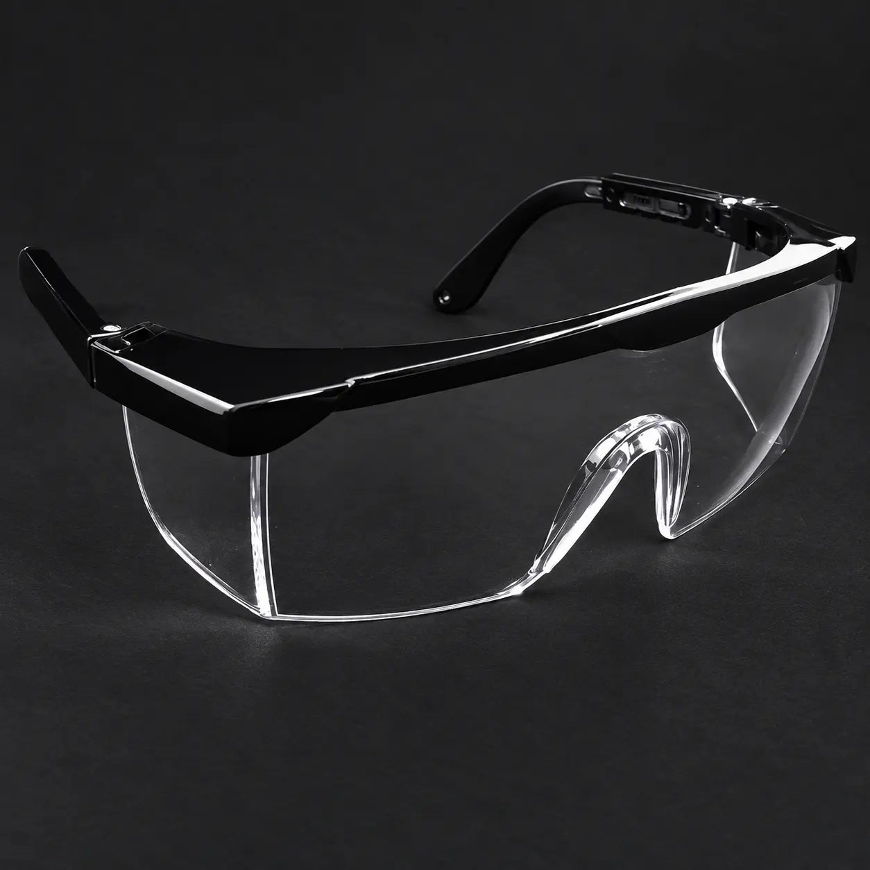 Clear medical protective safety glasses with black frame for eye protection.