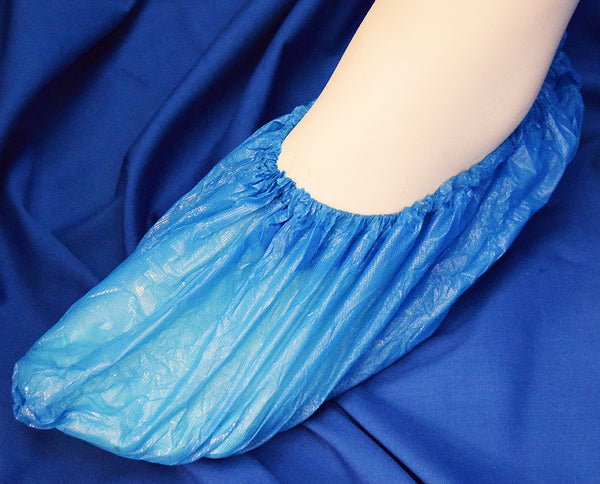 Mediflex blue protective footwear covers on a foot with elastic opening for secure fit